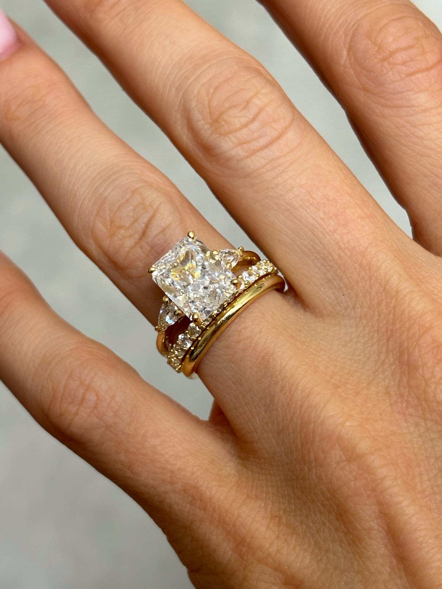 Radiant-Cut ring with pear-cut side stones