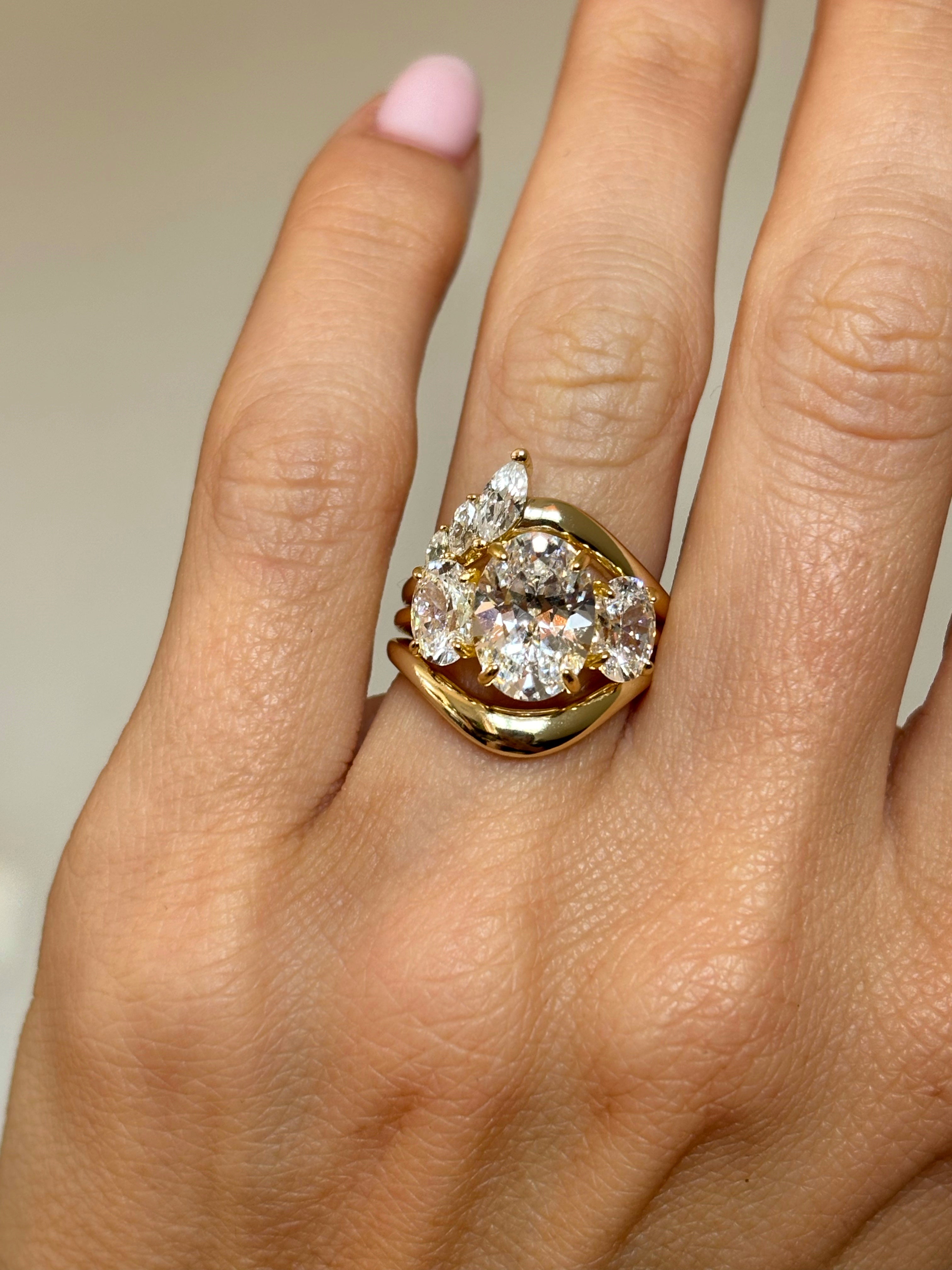 Curved band with marquise stones
