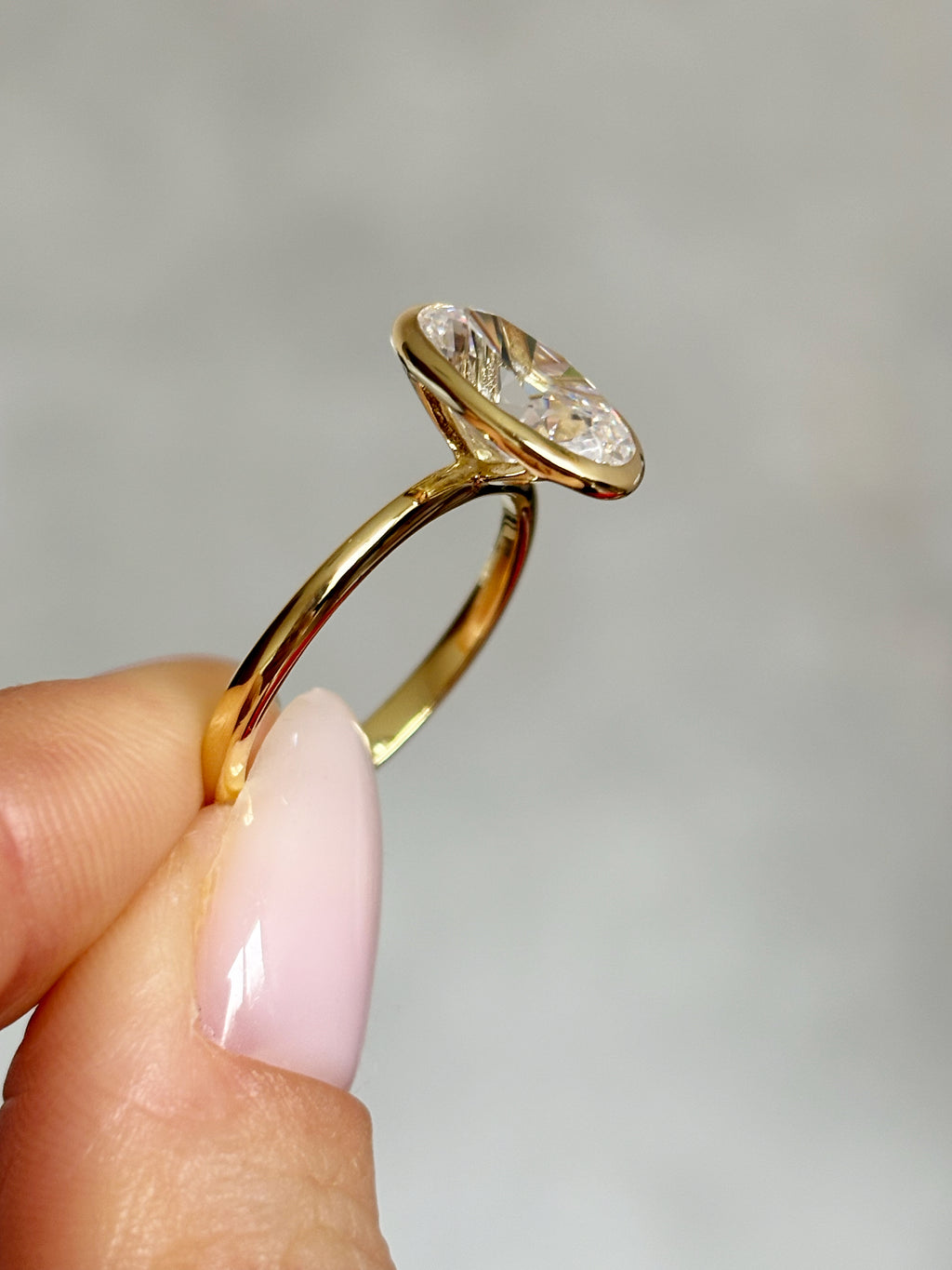 Bezel set Oval stone ring