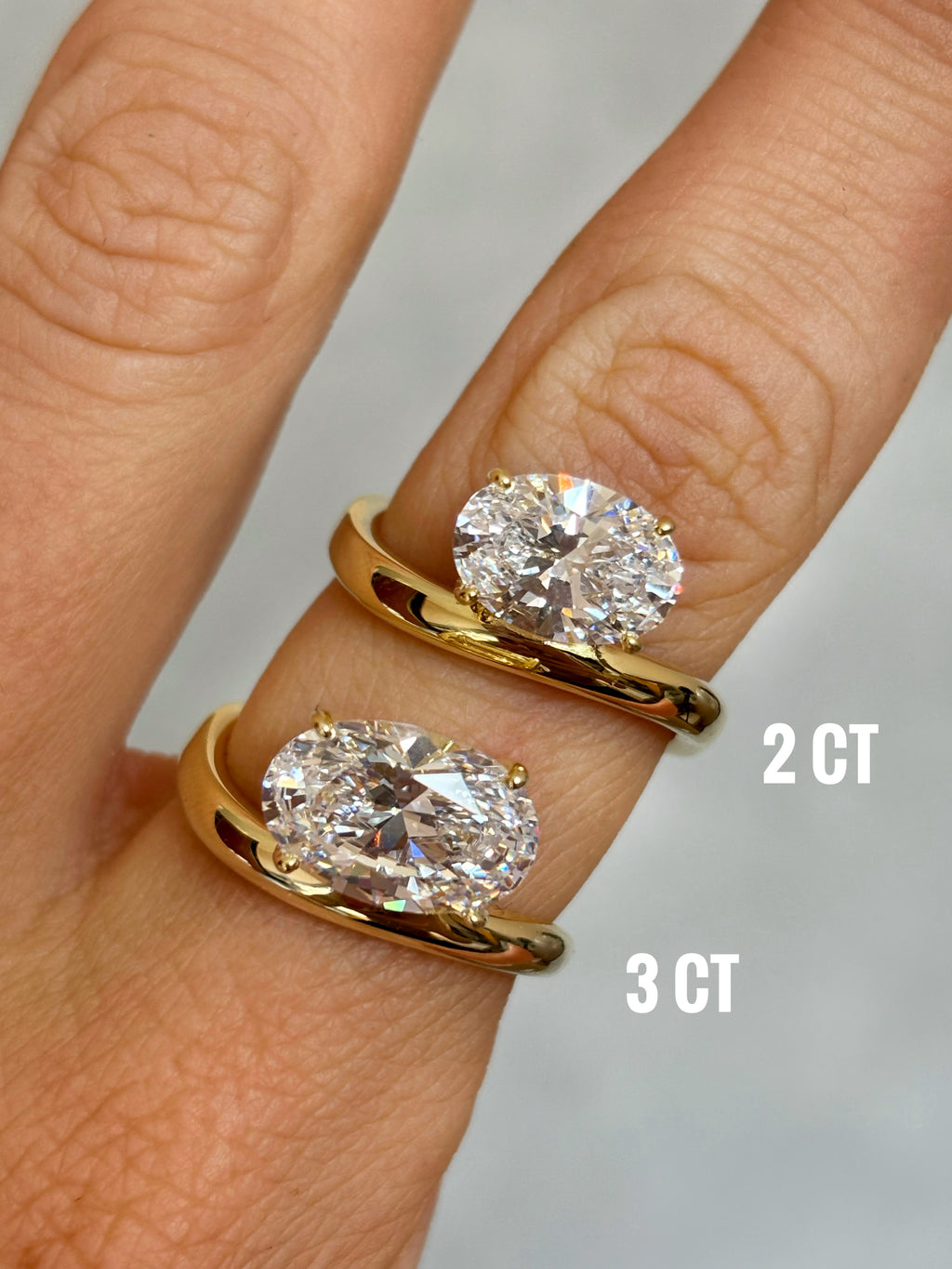 Oval stone ring with curved band