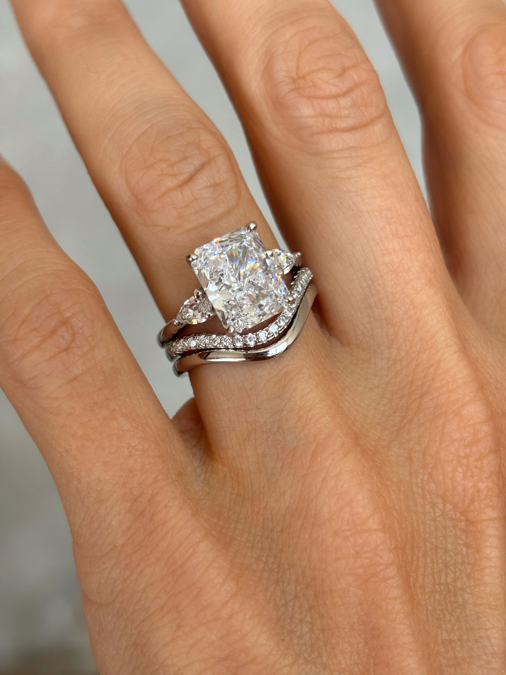 Radiant-Cut ring with pear-cut side stones