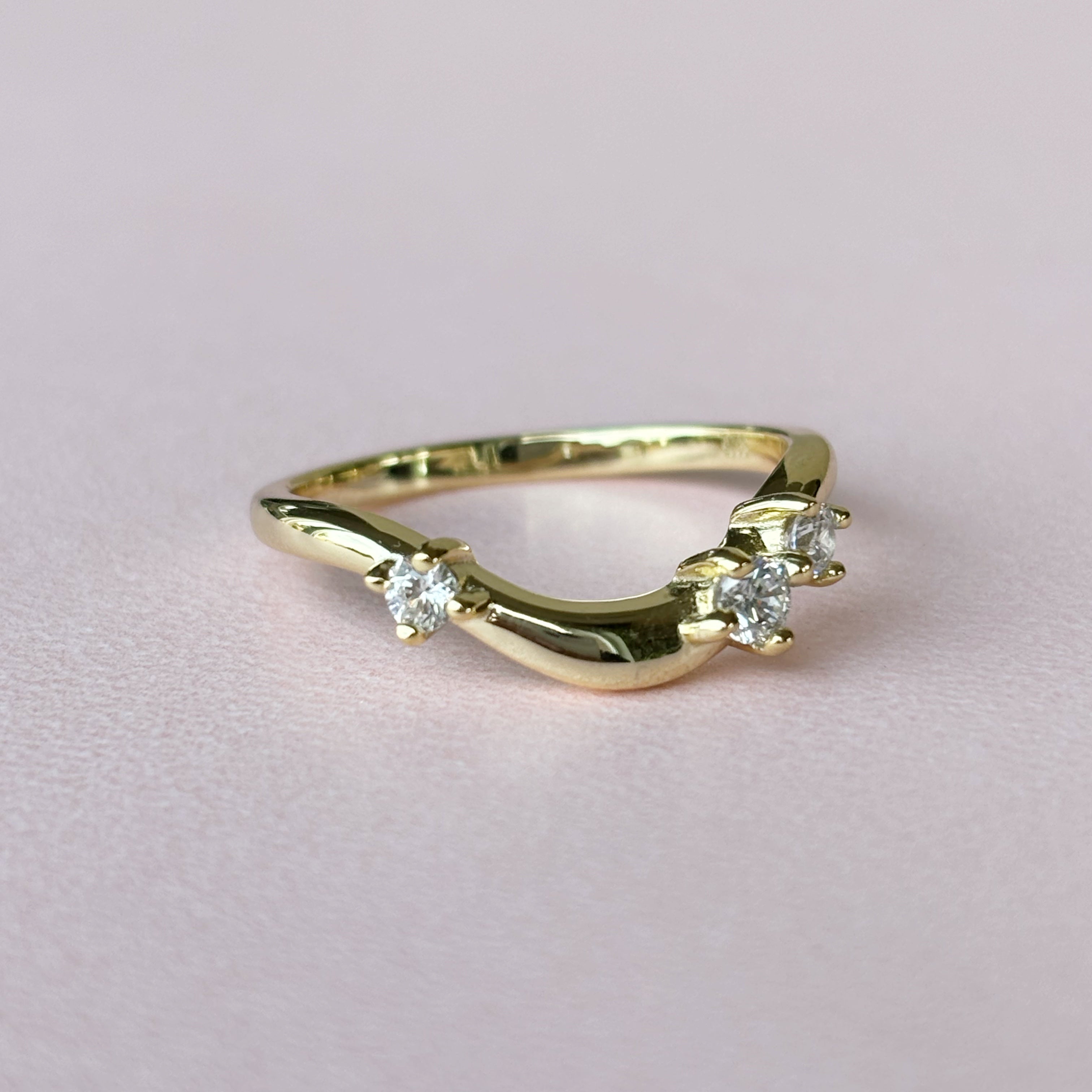 Curved band with round stones