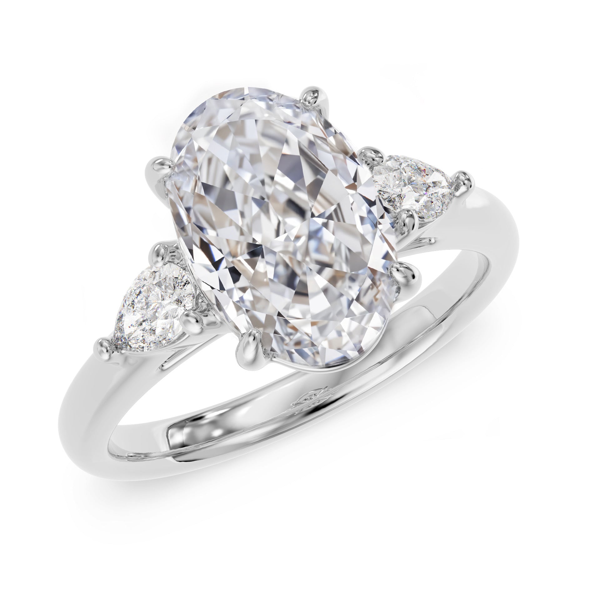 Oval stone ring with pear-cut side stones