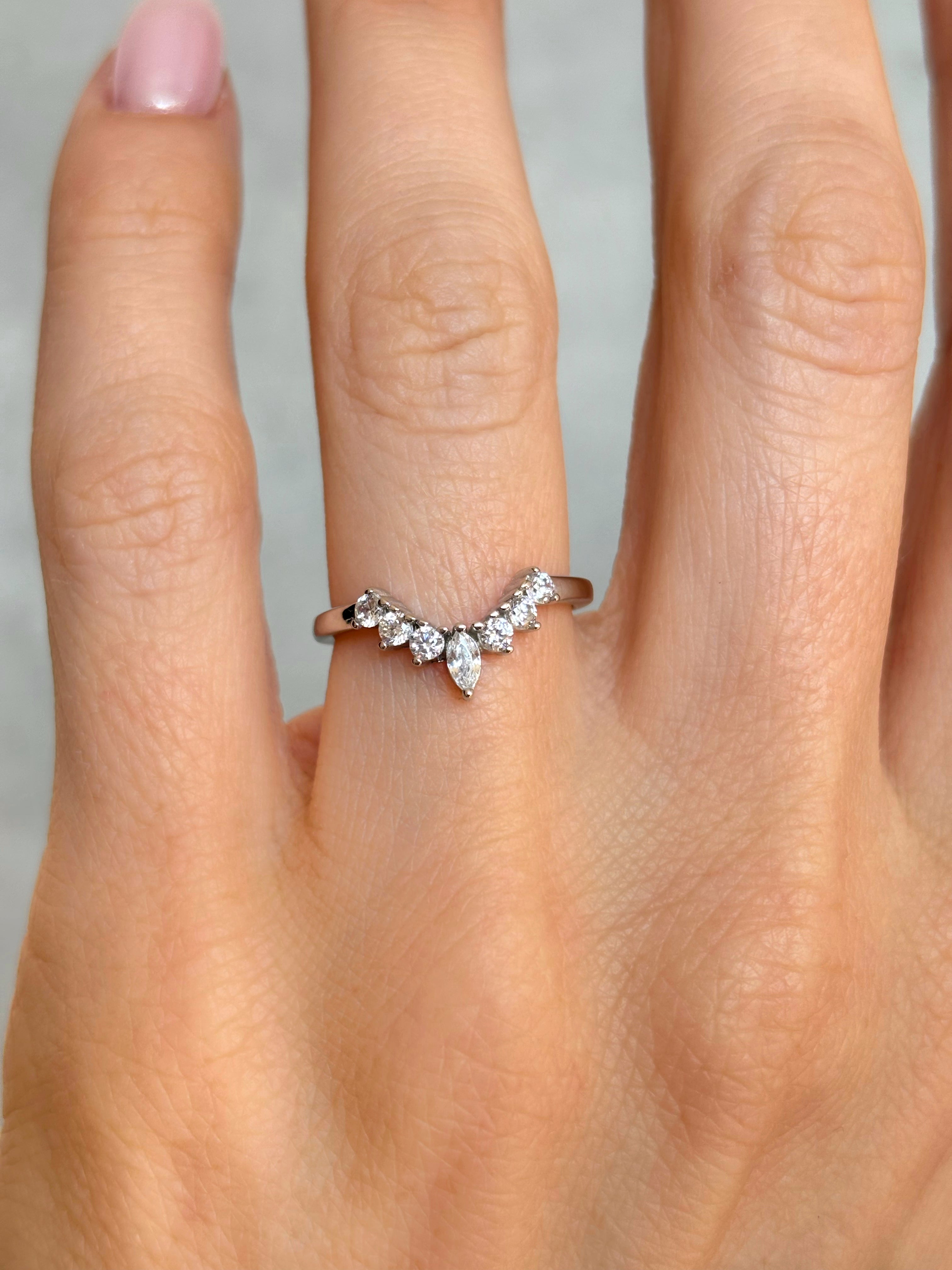 Curved crown ring