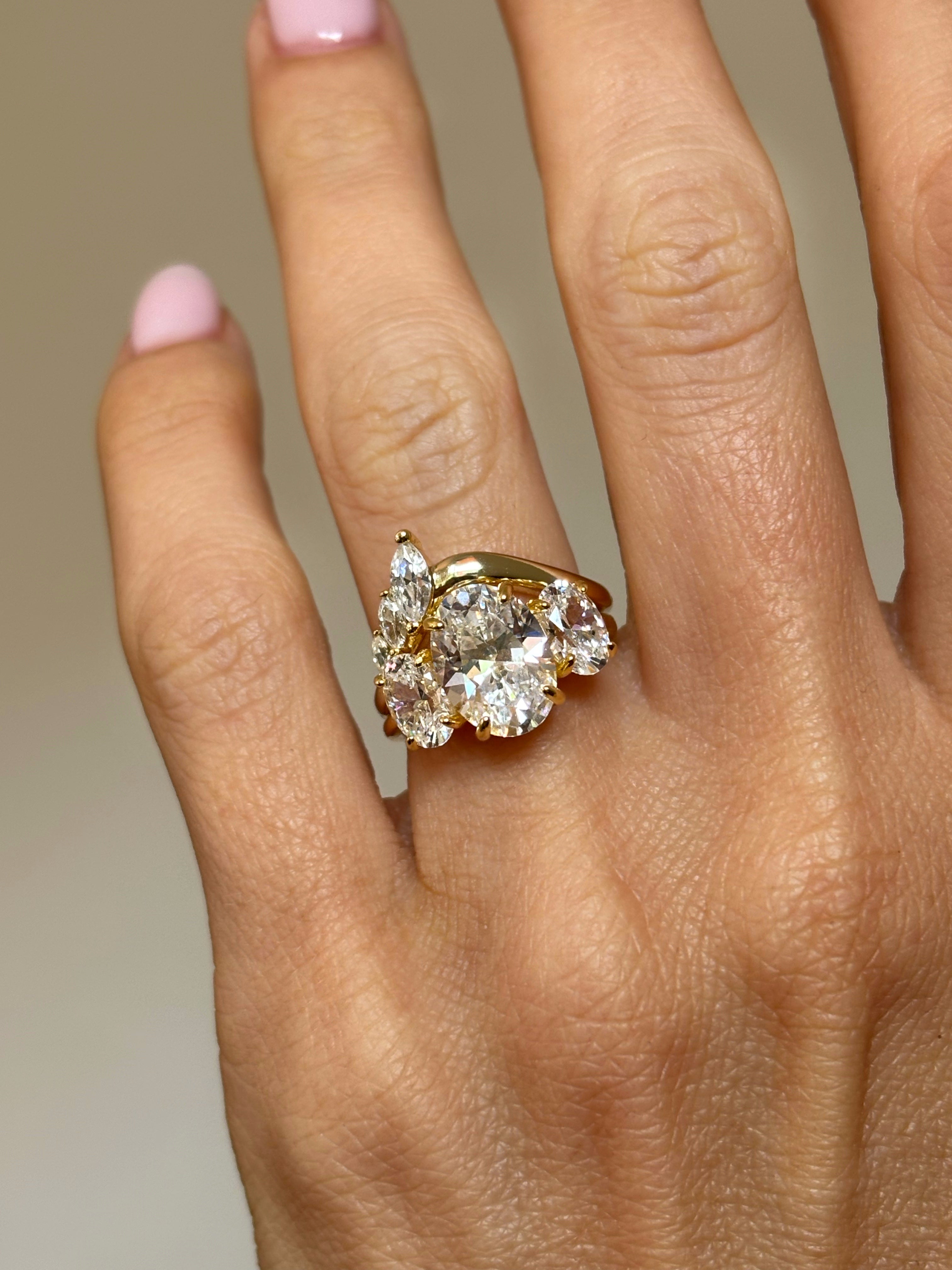 Curved band with marquise stones