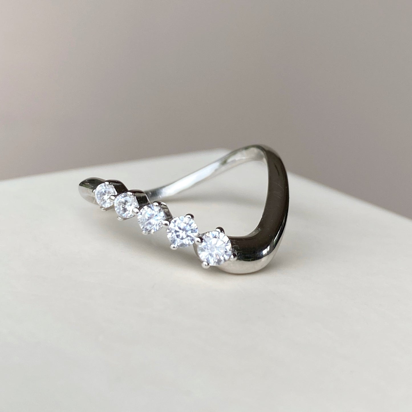 Melt curved ring