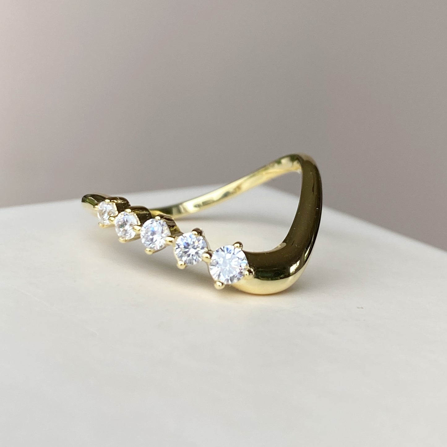 Melt curved ring