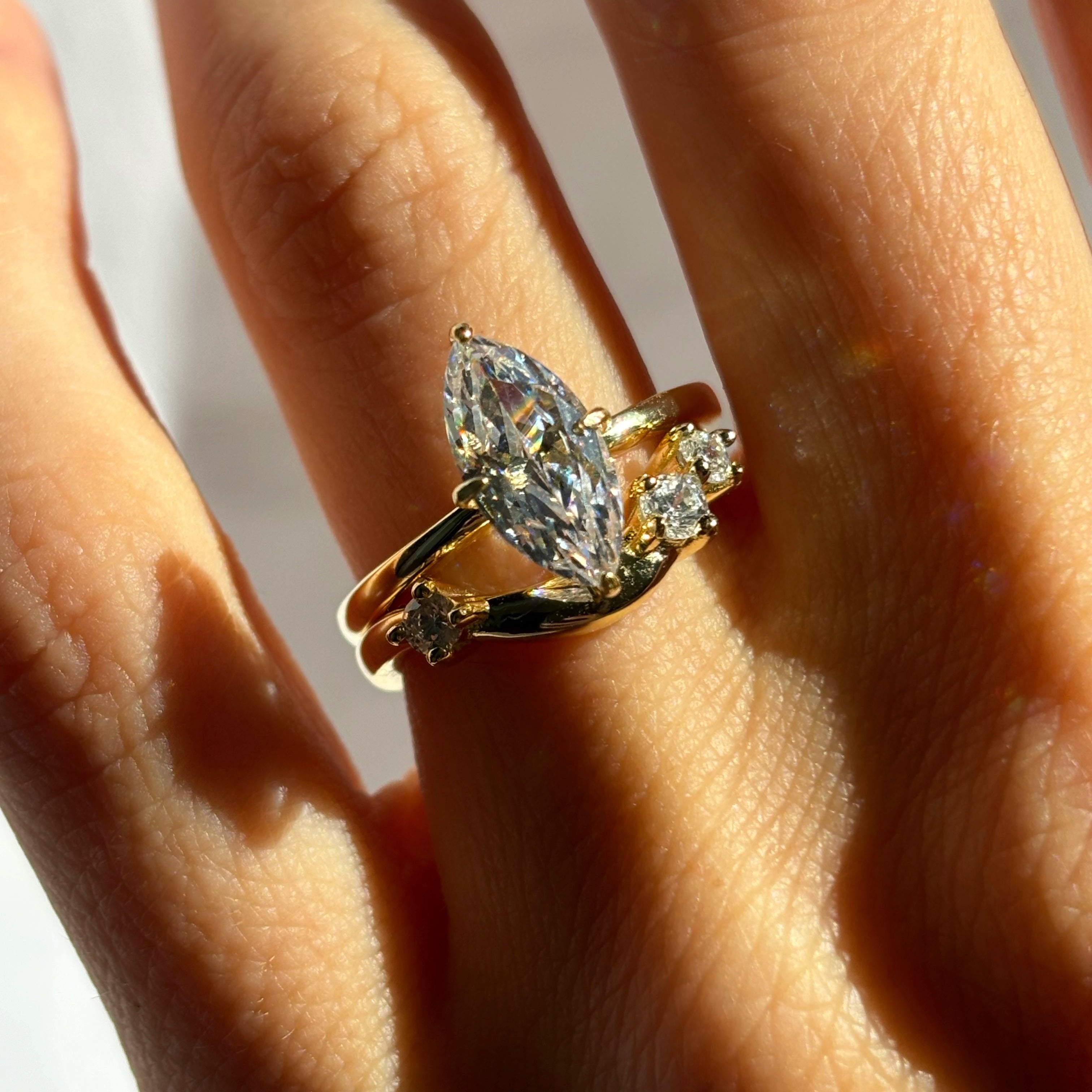 Curved band with round stones